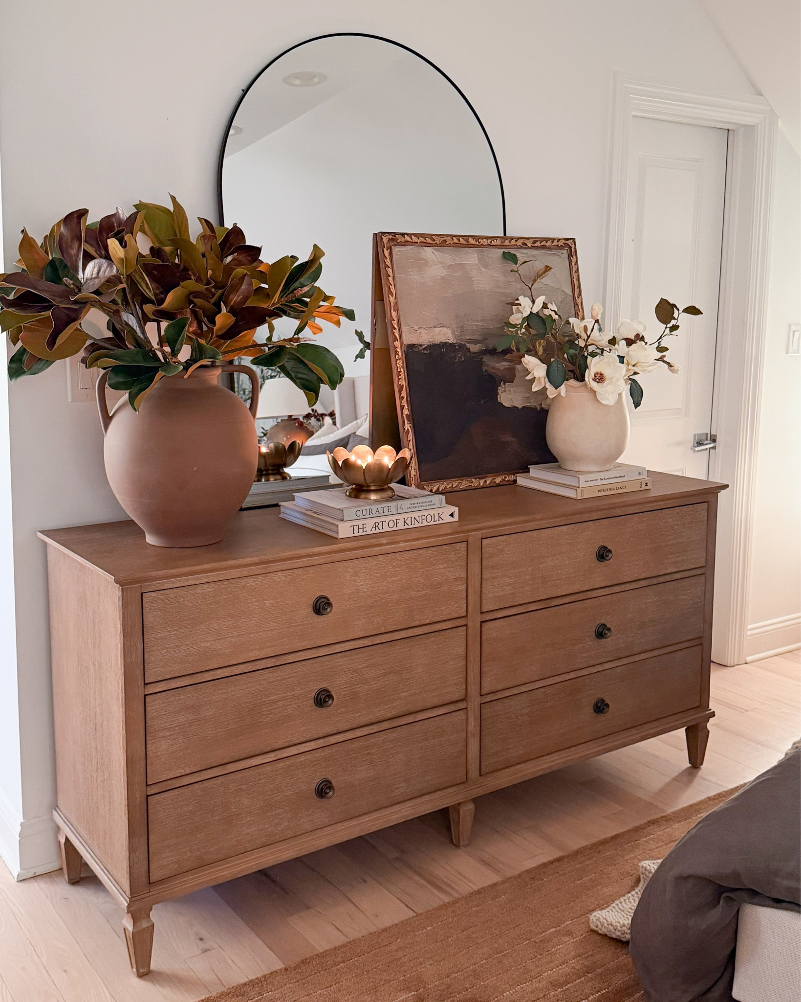 Winter styling on the dresser, the cozy way 🤍
Warm wood, soft florals, and simple layers that make this little moment feel so calm and elevated for the season. This dresser is one of my favorite anchor pieces — timeless, functional, and so easy to style year-round. 🤎

