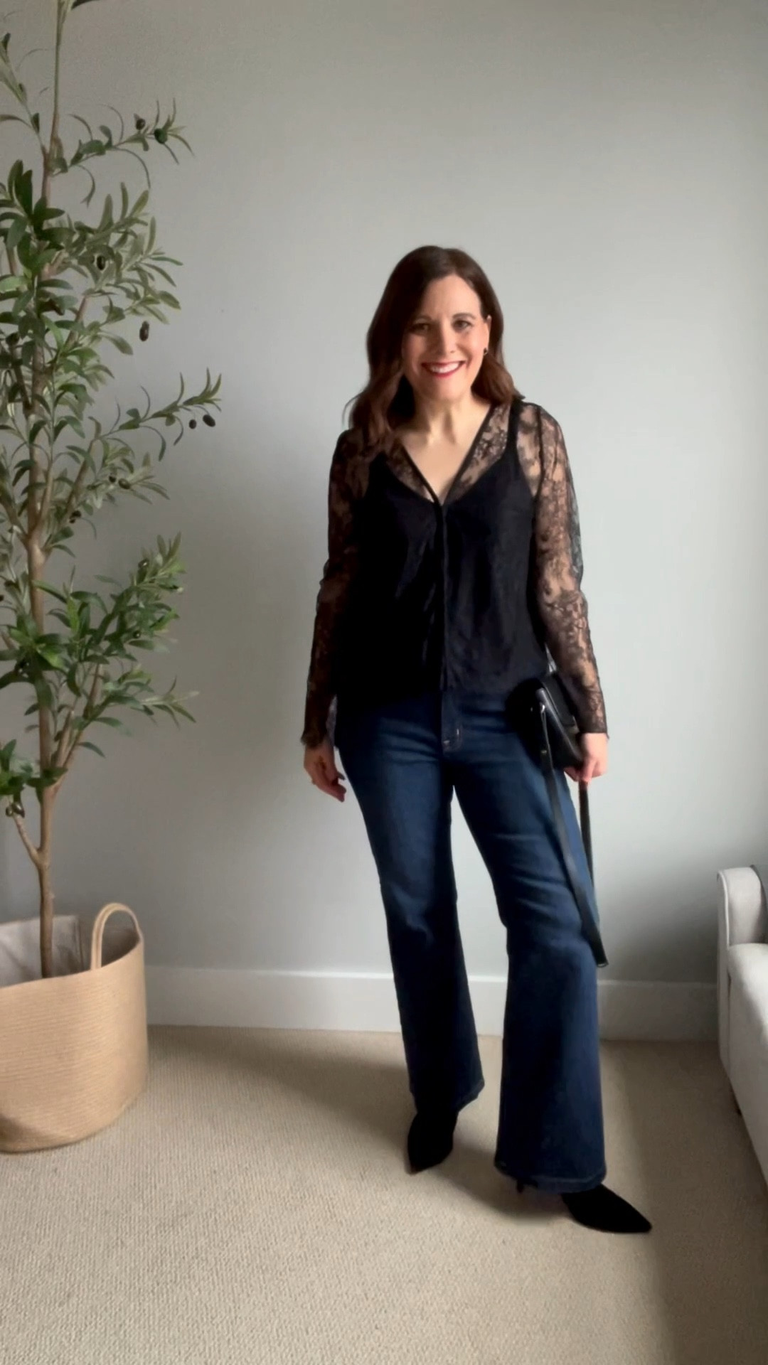 The black Chantilly lace blouse from LOFT is so pretty and comes with a slim, removable velvet waist tie and camisole. Wear it with jeans or black velvet pants, and with or without the waist tie. I am wearing a regular black bra underneath. It fits true to size, and I am in a small. I’m pairing it with Gap flare jeans sized up in the short length for flats.


#LTKHoliday #LTKOver40 #LTKCyberWeek