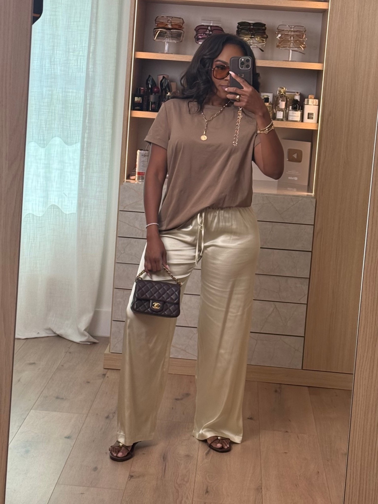 Scroll to shop this effortless neutral look 🤎

This outfit is the perfect mix of comfy and elevated — the relaxed neutral tee paired with silky wide-leg pants gives that effortless luxe vibe while still feeling easy enough for everyday wear. These are the kind of staples you’ll keep restyling over and over again, making the cost per wear so worth it.

Perfect for brunch, travel days, casual dinners, errands, and everyday elevated looks.

📏 Measurements: 5’4”, 140 lbs, 34D bust, 27” waist, 40” hips

Follow me on Instagram and YouTube @kirasfashionfinds

#LTKootd #LTKgrwm #LTKPetite
