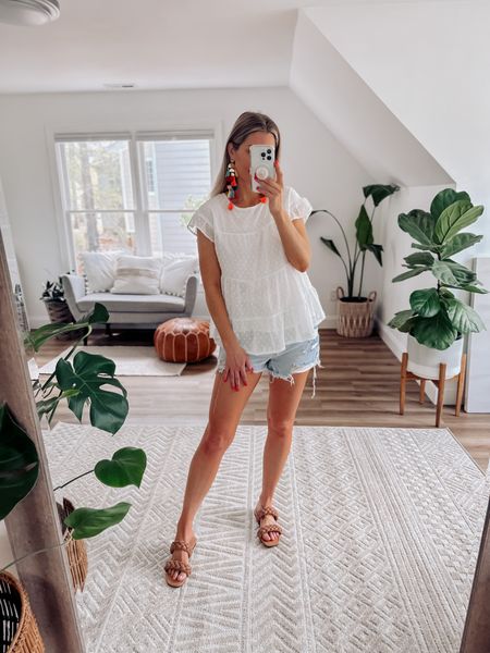 Perfect white top and Jean shorts look with colorful festival drop tassel earrings and braided sandals. Wearing a medium in all. 

#LTKFestival #LTKswim #LTKtravel