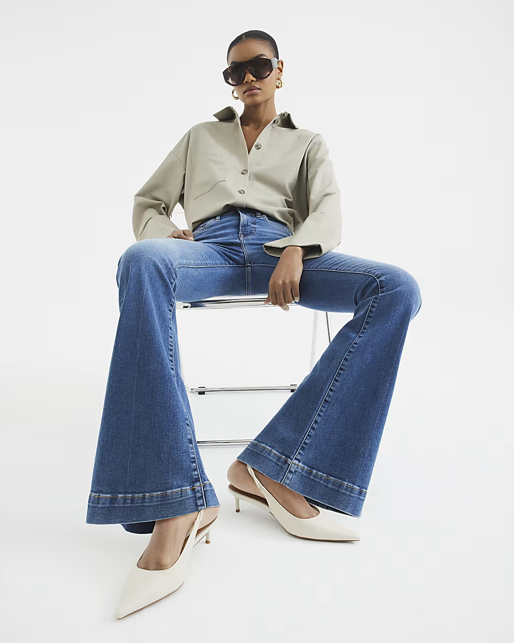 Blue High Waisted Tummy Hold Flared Jeans | River Island (UK & IE)