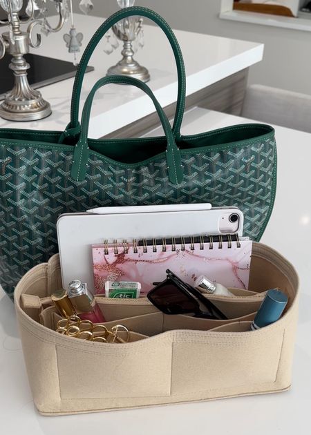 What’s in my bag! This bag organizer is the best way I keep my work bag organized and makes it easy for me to find everything I need. #luxuryfashion #workbag #totebag

#LTKtravel #LTKitbag #LTKworkwear