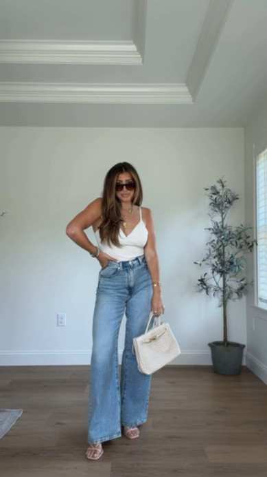 Seamless ribbed tank tops with built in bra and no shelf bra! Wearing med. Could have done small. Jeans at size 27! Code J4LRD4KQ to save extra 10% on tops!

#LTKootd #LTKgrwm #LTKSaleAlert