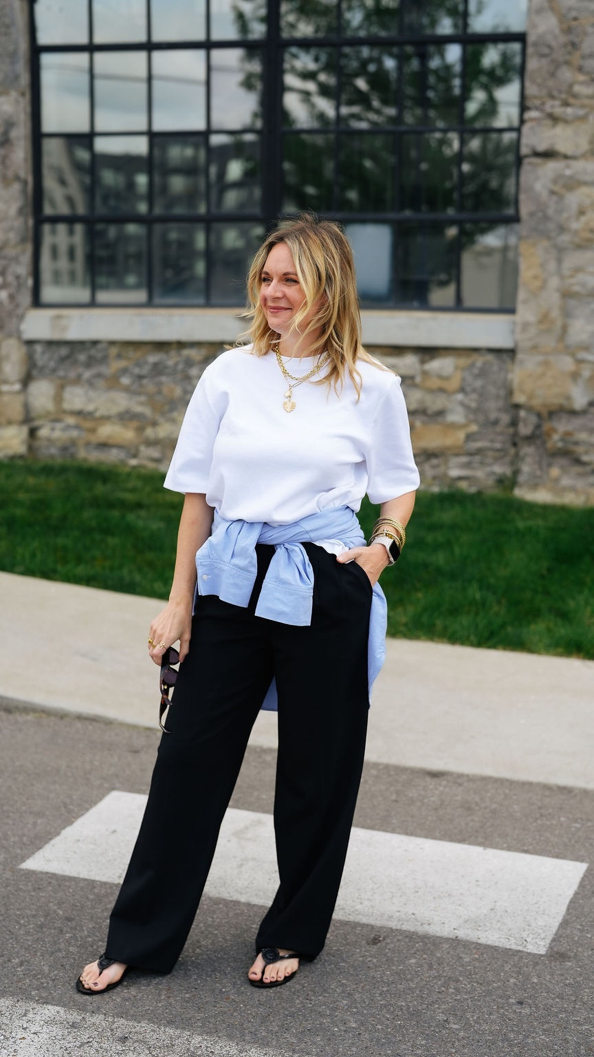 Unpopular opinion: flip flops look better with trousers than sandals do 👇

Here's why:

✨The casualness is the whole point. A dressy sandal with trousers reads as trying too hard. A flip flop creates the kind of contrast that makes an outfit feel effortless and confident instead of overly polished.

✨It's having a real moment right now. Flip flops are showing up everywhere from street style to runway looks — paired with trousers, they're one of the most current shoe choices you can make.

✨It proves you don't need a "fancy" shoe to look put together. When the rest of your outfit is intentional — a great trouser, a tied layering piece — the shoe can be as simple as it gets and the whole look still reads as styled.

OOTD for an easy weekend ✨ Oversized white tee + black trousers + a shirt tied at the waist + black jelly flip flops. All from my own closet — linked the closest versions I could find. Everything shoppable below! 👇

#LTKdayinmylife #LTKootd #LTKOver40