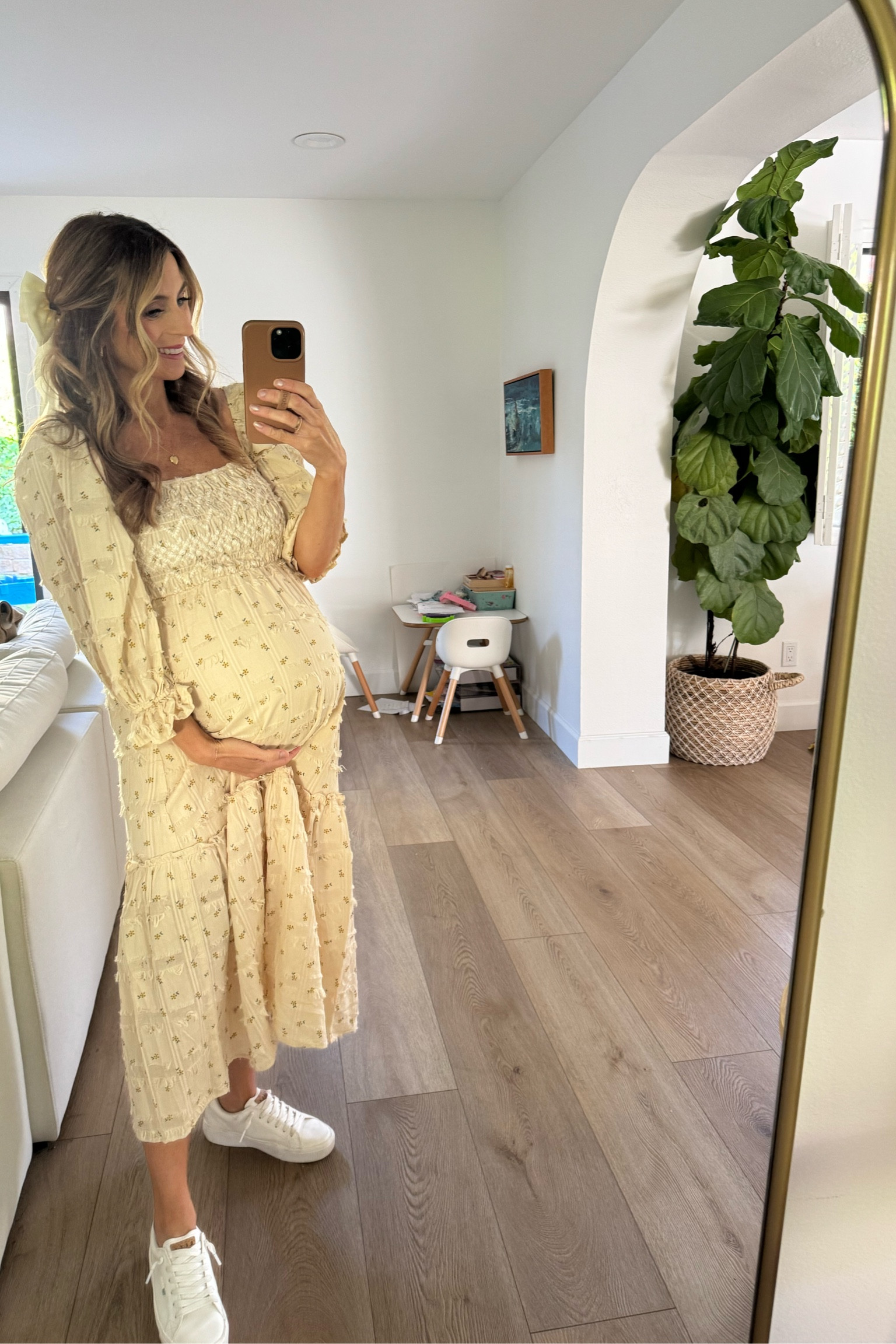 The sweetest spring dress! I got this one because it fits over the bump, but it will be great for postpartum. Flowy & forgiving, & the chest is stretchy for nursing. Styled with tennis shoes to keep it casual & comfy + and bow for finishing touches!! 

Spring dress, pregnancy style, maternity dress, maternity 

#LTKfamily #LTKSeasonal #LTKbump