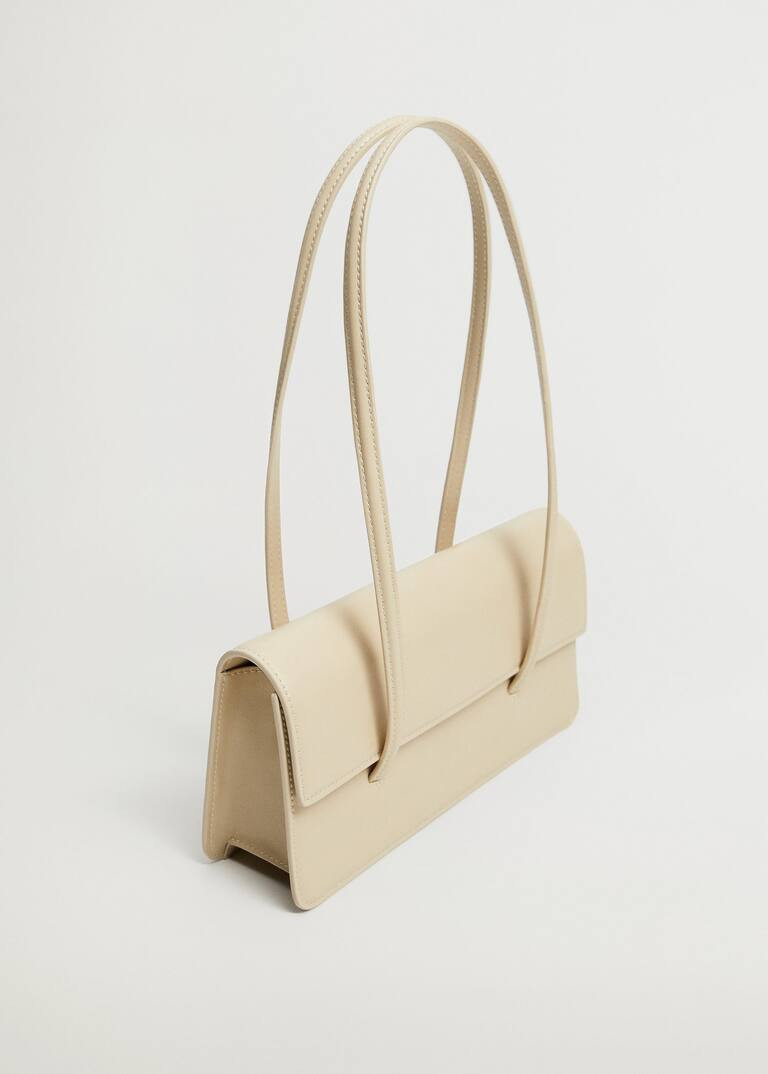 Double handle baguette bag

Baguette design. Rigid design. Medium. Double strap. Flap closure. Inner | MANGO (US)
