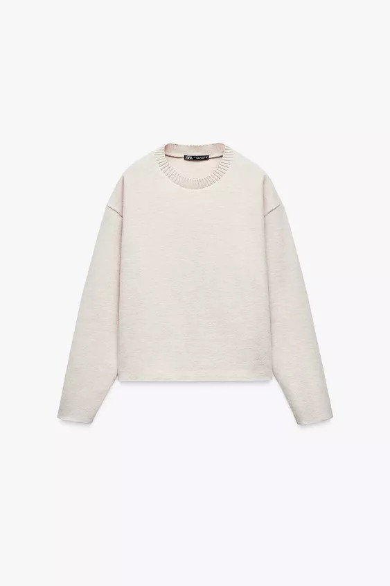Sweater with ribbed round neck. Seamless long sleeves. | Zara US
