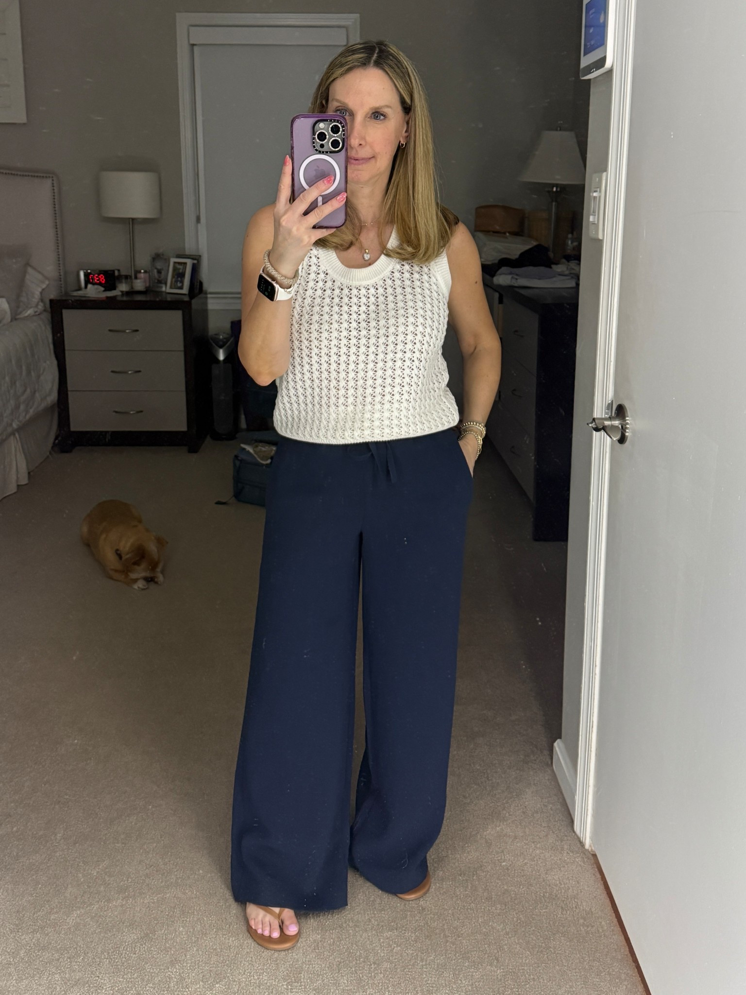 Dinner outfit for hot spring night - varley top, Aritzia lodge pants (petite length), simple tkees

#LTKootd #LTKOver40