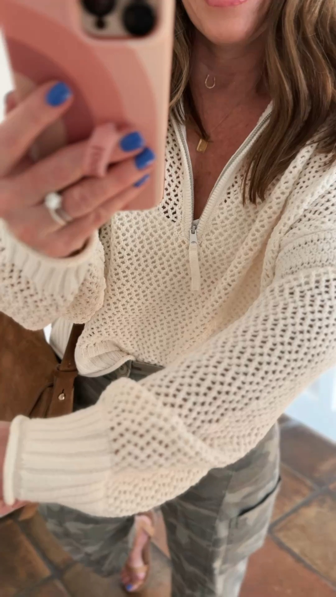 The viral crochet sweater is back again with a slightly new design around the zipper. I’m wearing my true size medium. It’s available in two solid colors and two striped options. You can dress it up or down. It’s so lightweight and comfy with an oversized slouchy fit.

#LTKMidsize #LTKOver40 #LTKootd