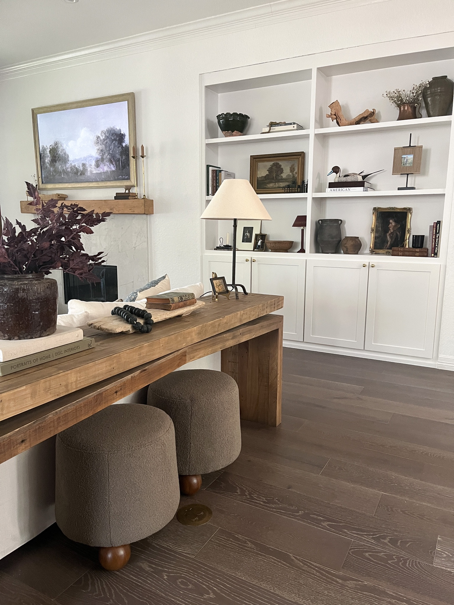 Living room
Bookshelf styling
Console table
Neutral decor
Transitional home 

#LTKhome #LTKstyletip #LTKsalealert