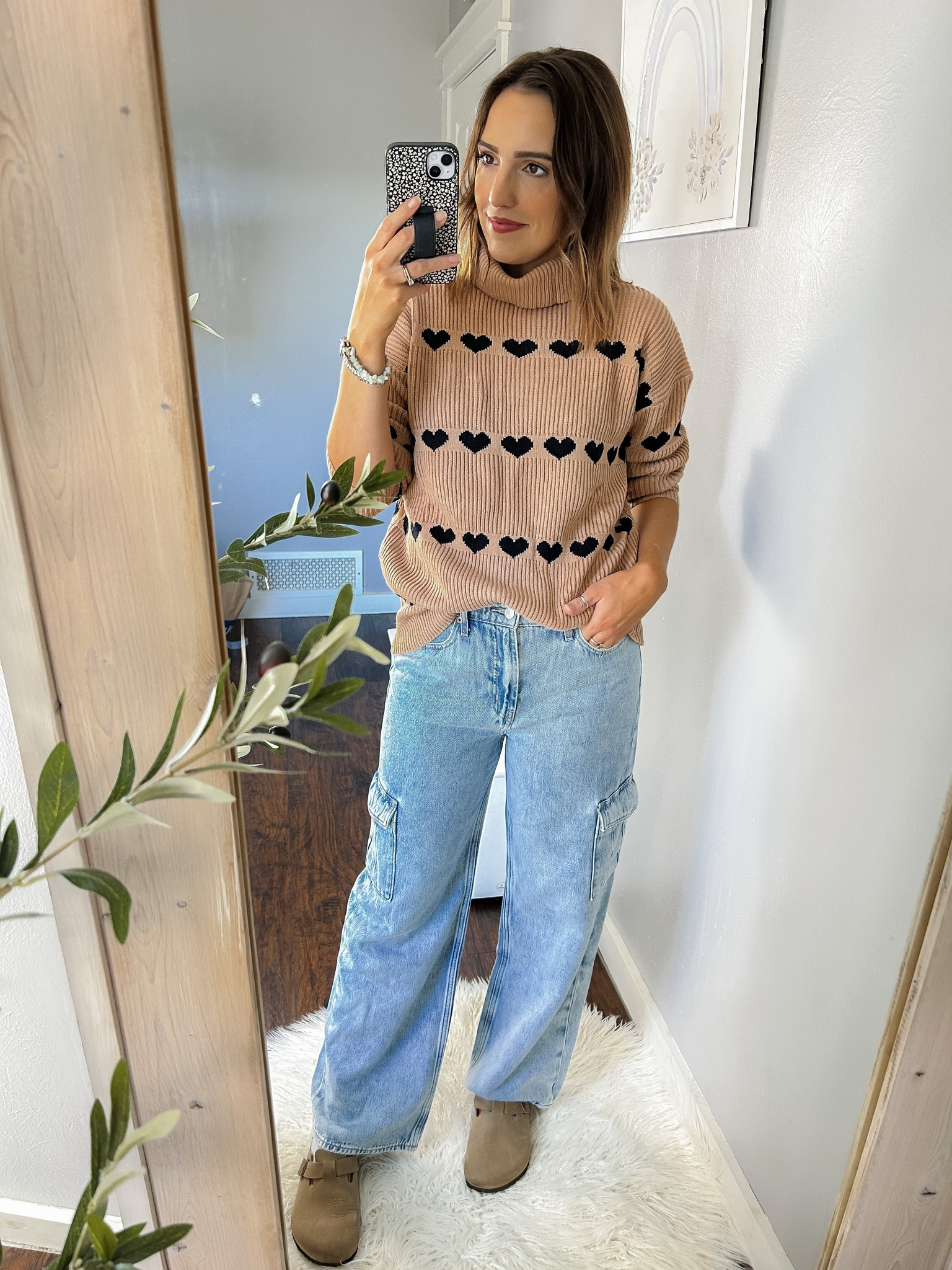 Amazon sweater / Heart print turtleneck tan sweater — TTS, S
Old Navy cargo wide leg jeans — TTS, 6
Birkenstocks — TTS
Victoria Emerson bracelet 
White shag rug

#LTKfindsunder50 #LTKstyletip #LTKSeasonal