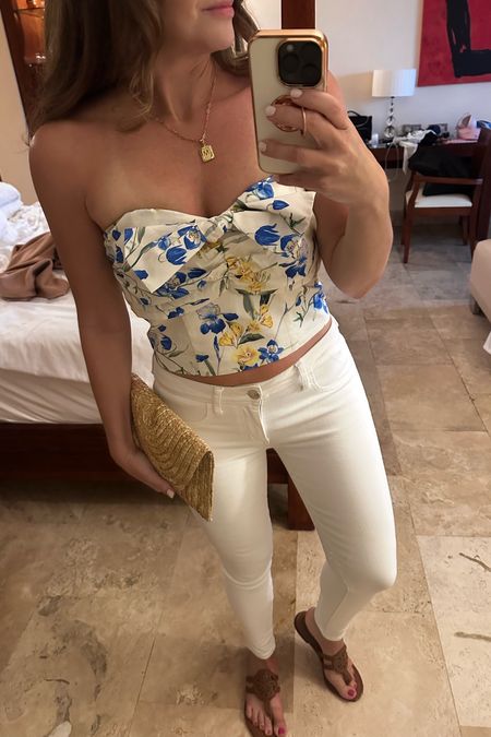 Vacation ready with white jeans and this cute strapless top from Express, currently on sale! My fun straw clutch is an Amazon find I used every night of our trip!

#vacationstyle #resortwear #vacationoutfit #strawbag #vacation #tropicalstyle #datenight #expressstyle #express #warmweather #ootd

#LTKtravel #LTKstyletip #LTKsalealert
