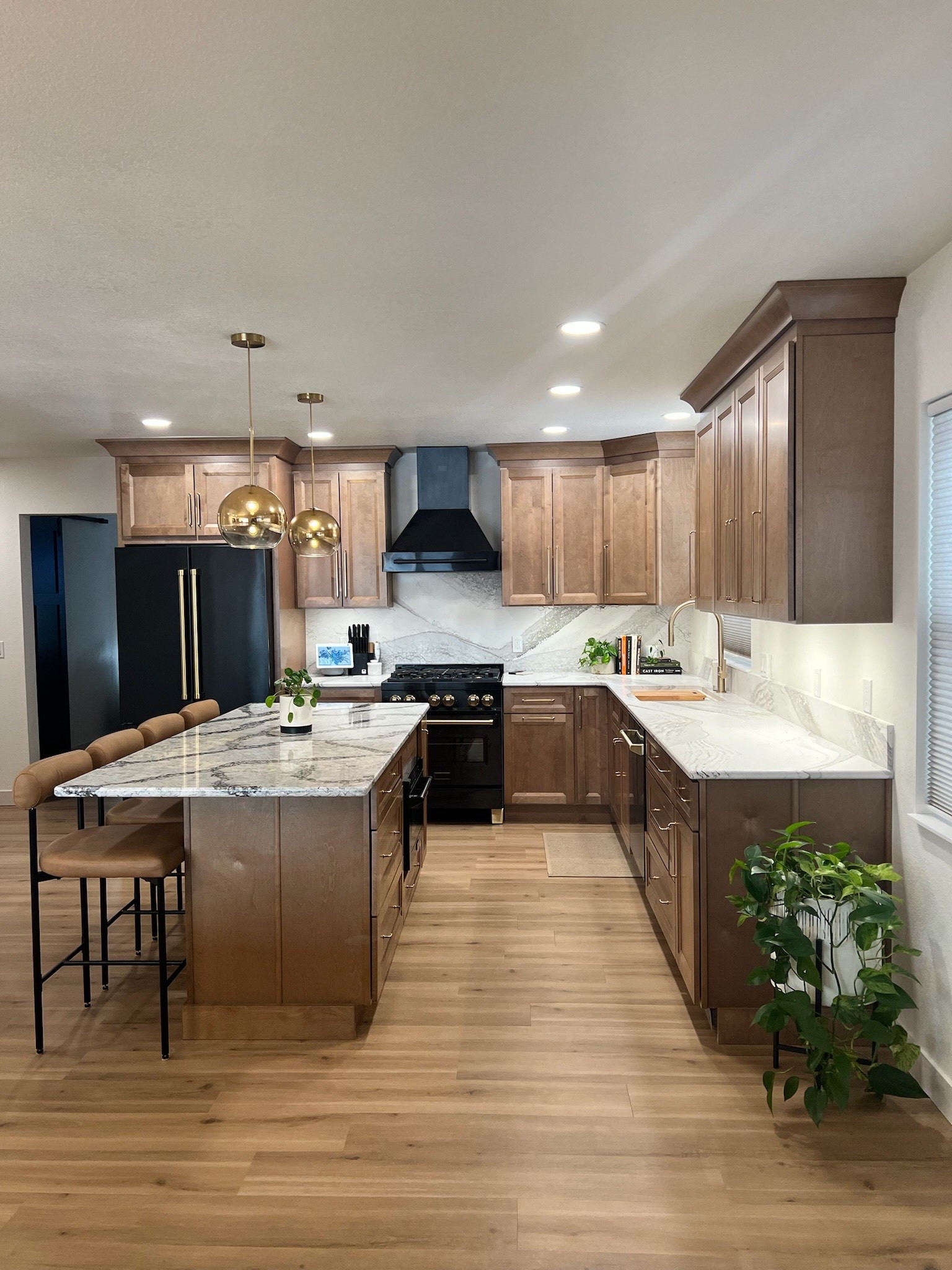 Black appliances are BACK! It’s a misconception that only stainless steel appliances can look high end. The black with the natural wood is breathtaking! 

#LTKHome #LTKFamily