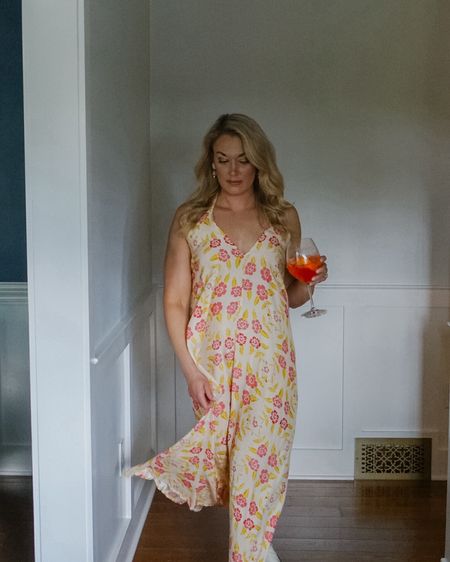 Summertime loading in this flowy floral halter that can be worn to a nice dinner or just lounging on your patio from Natalie Martin Collection 

#LTKHome #LTKTravel #LTKWedding