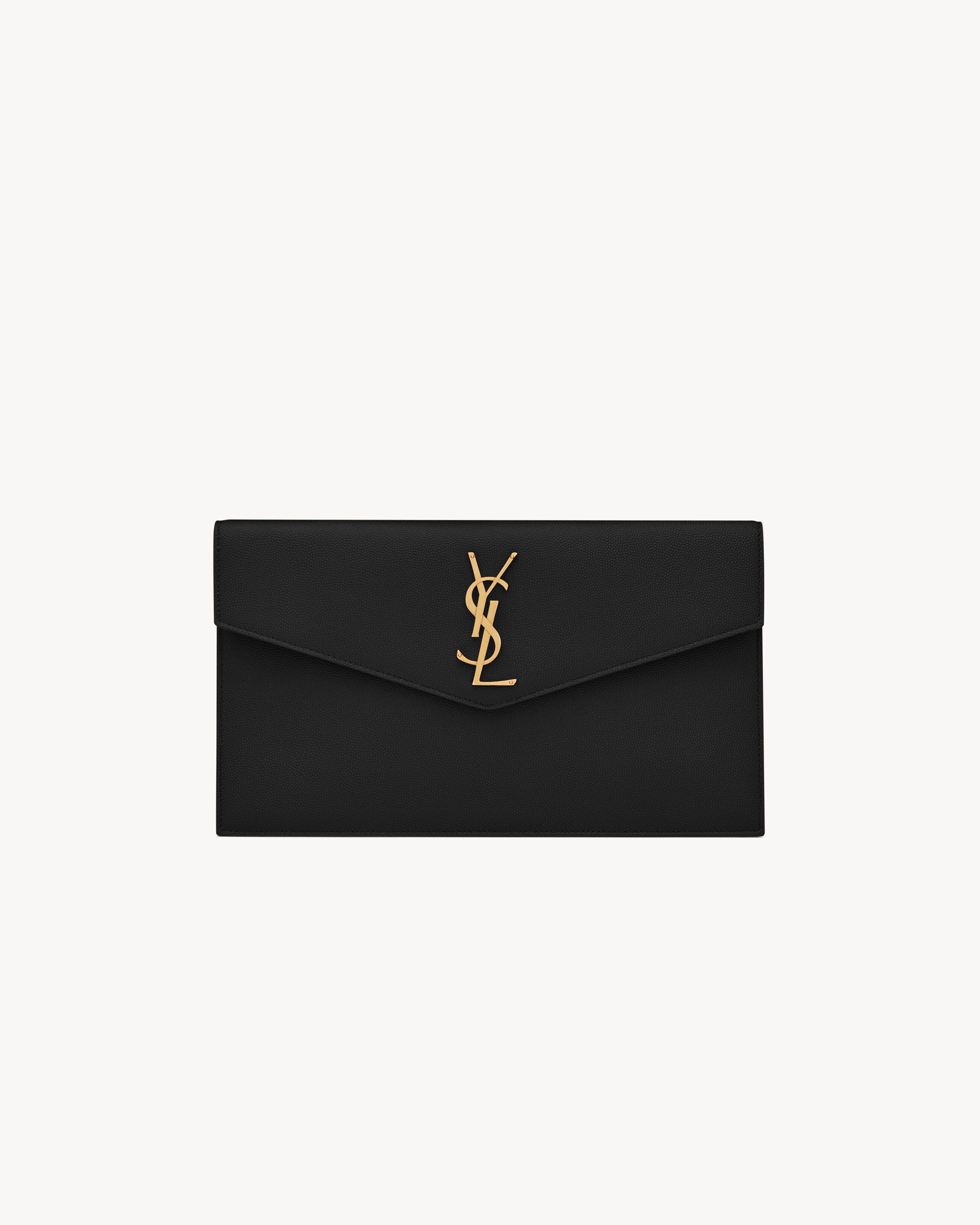 Small envelope clutch with a flap featuring THE CASSANDRE. | Saint Laurent Inc. (Global)
