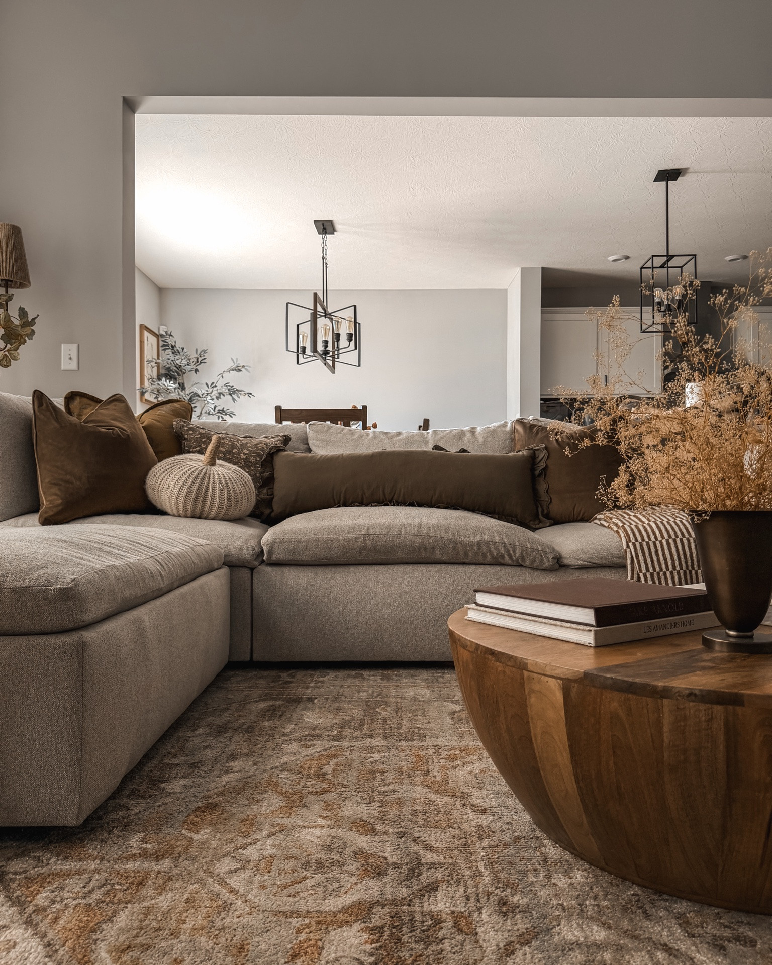 Fall living room styling, cozy living room, sofa sectional, fall throw pillows, living room rug, fall coffee table styling, fall florals, coffee table books, fall decor, fall styling, neutral home

#LTKHome #LTKSeasonal