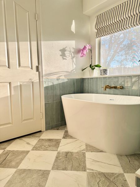 Bathroom ideas. Bathroom remodel with tub. Small bathroom renovation. 

#LTKhome #LTKSeasonal #LTKsalealert