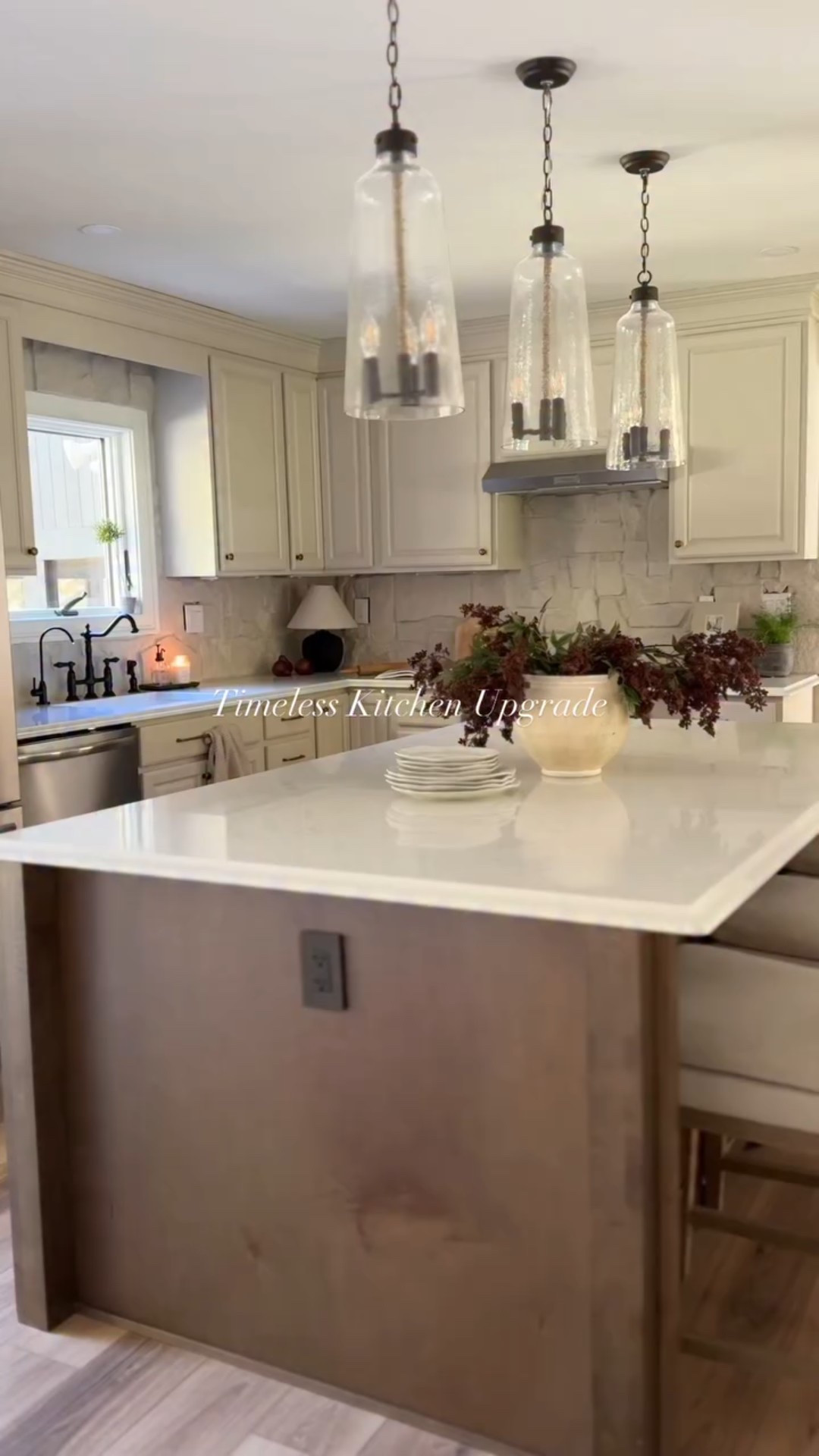 These new pendant lights have completely changed our kitchen. These were the original lights I wanted for our remodel, but they were sold out by the time we were ready to install lighting. The center wrapped in seagrass was what caught my eye as it ties in our dining light. 

A MUCH needed upgrade to our kitchen! 

Choosing lighting that flows in your home makes all the difference. Our initial lights were far too heavy and dark. They were inexpensive and got the job done for the time being, but I truly couldn’t be happier with how this came out! 

Comment “SHOP” for the link. 

#neutralhome #kitchen #cottagestyle #neutraldecor #home #renovation