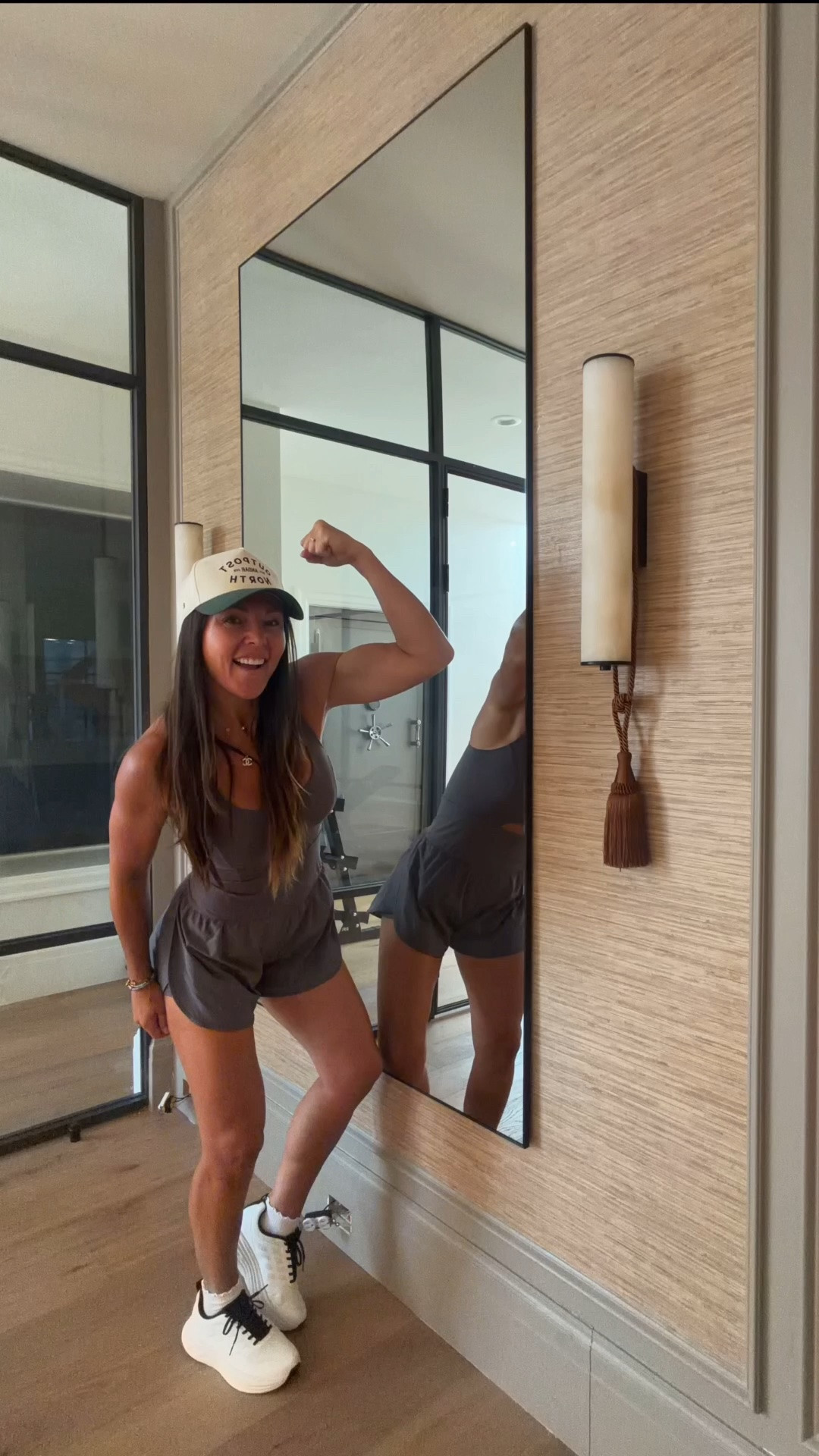 Swanky hotel style home gym on a diy budget. Alabaster sconces with tassel curtain tie to add a little sparkle. 
Faux grasscloth wallpaper.

#LTKSaleAlert #LTKHome
