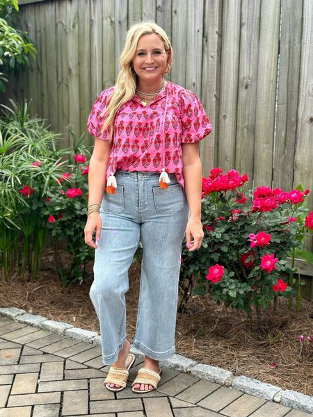 Obsessed with this top from the tassels to the bright pink! I am wearing a small top and size 26 jeans. Code FANCY15 for 15% off.

#LTKfindsunder100 #LTKstyletip #LTKSeasonal