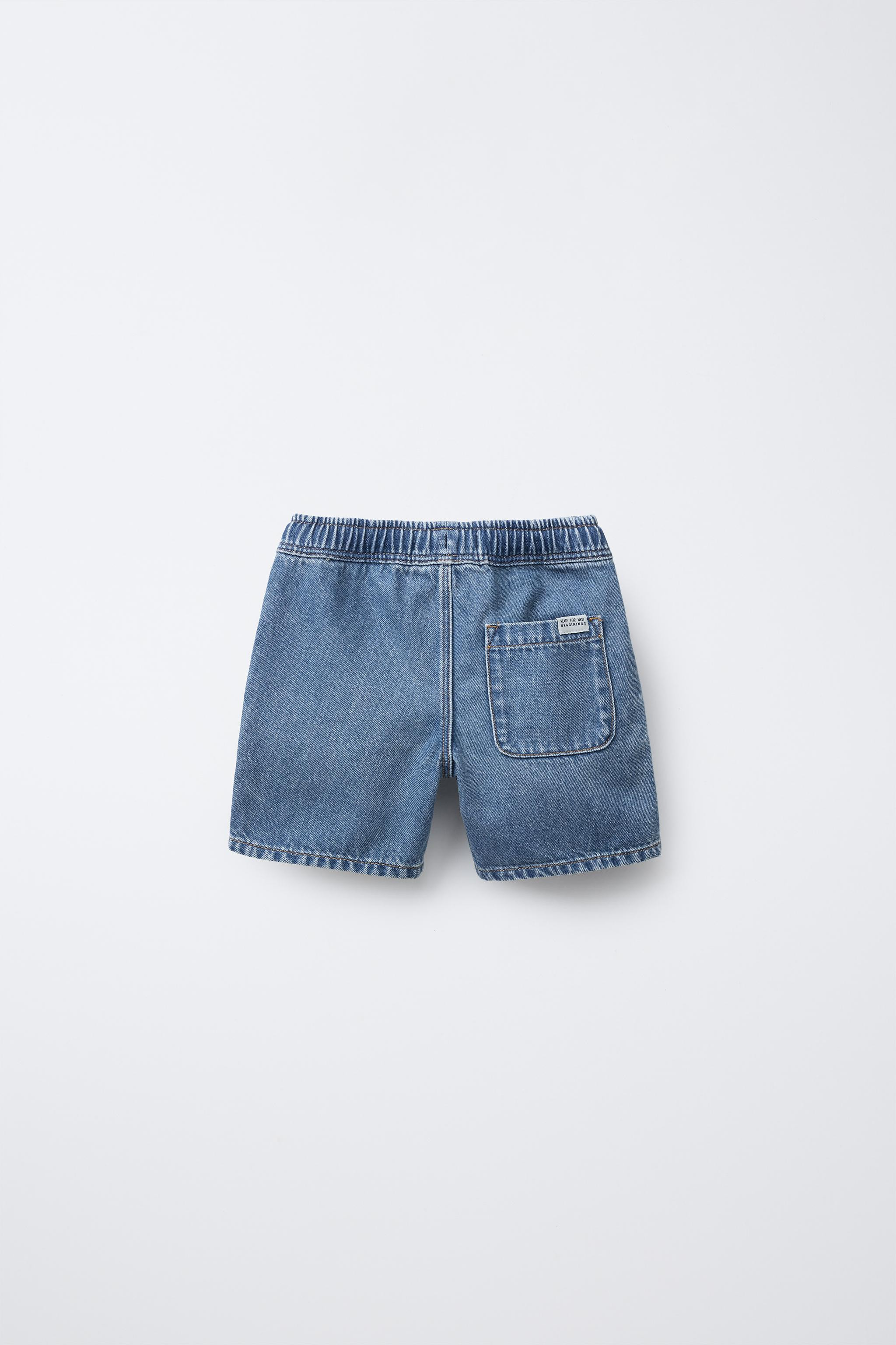 Denim shorts with elastic waistband and adjustable front drawstring. Front pockets and back patch... | Zara US