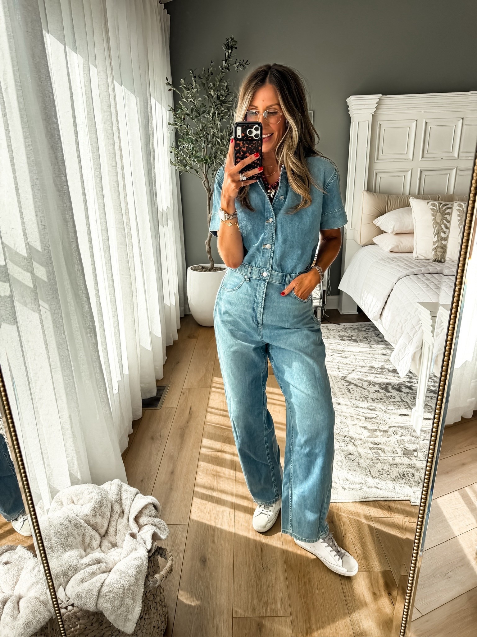 Denim but make it one and done 🙌🏼This jumpsuit is the easiest throw on and go piece but still looks so put together. I love the relaxed fit and how you can dress it up with accessories or keep it casual with sneakers like this

denim jumpsuit, casual outfit idea, one piece outfit, everyday style, effortless look, comfy chic, themominstyle 

#LTKOver40 #LTKootd #LTKSeasonal