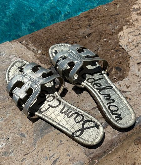 Gold slides 
Summer 
Vacation 
Resort wear 
Pool sandals 

#LTKshoecrush #LTKSeasonal #LTKSale