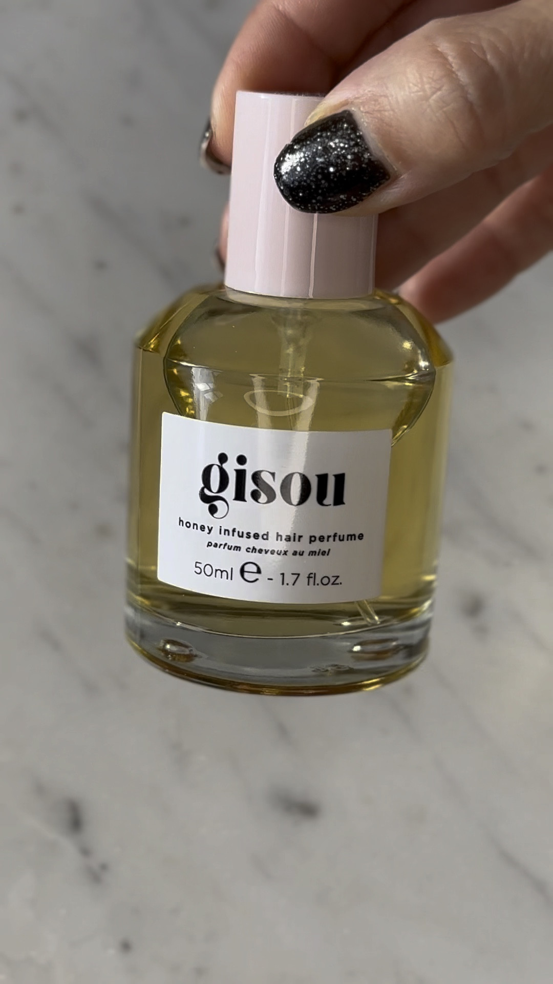 Just tried Gisou Honey Infused Hair Perfume, and I'm beyond pleased! 🌟 The scent is an enchanting mix of honey and flowers, lingering beautifully with every swish. 🌺💫 My hair has never felt more luxurious. The warmth it adds to my hair is irresistible, lasts on my hair for the whole day and I'm loving the compliments I get! 💖✨ Highly recommend – A definite game changer and a true gem in the world of hair care! 🤩✨

They have it in 50ml and 100ml. Planning to get a second one in 100ml as I absolutely love it! 🥰 

If you're going to purchase one Gisou product, this is it! 

Follow for more inspo 💖

#haircare #LTKGift #Giftideas #Beautygift 

#LTKHoliday #LTKbeauty #LTKGiftGuide