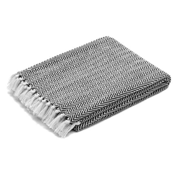 The Curated Nomad Renere Black and White Herringbone Throw Blanket with Fringe - Overstock - 3042... | Bed Bath & Beyond