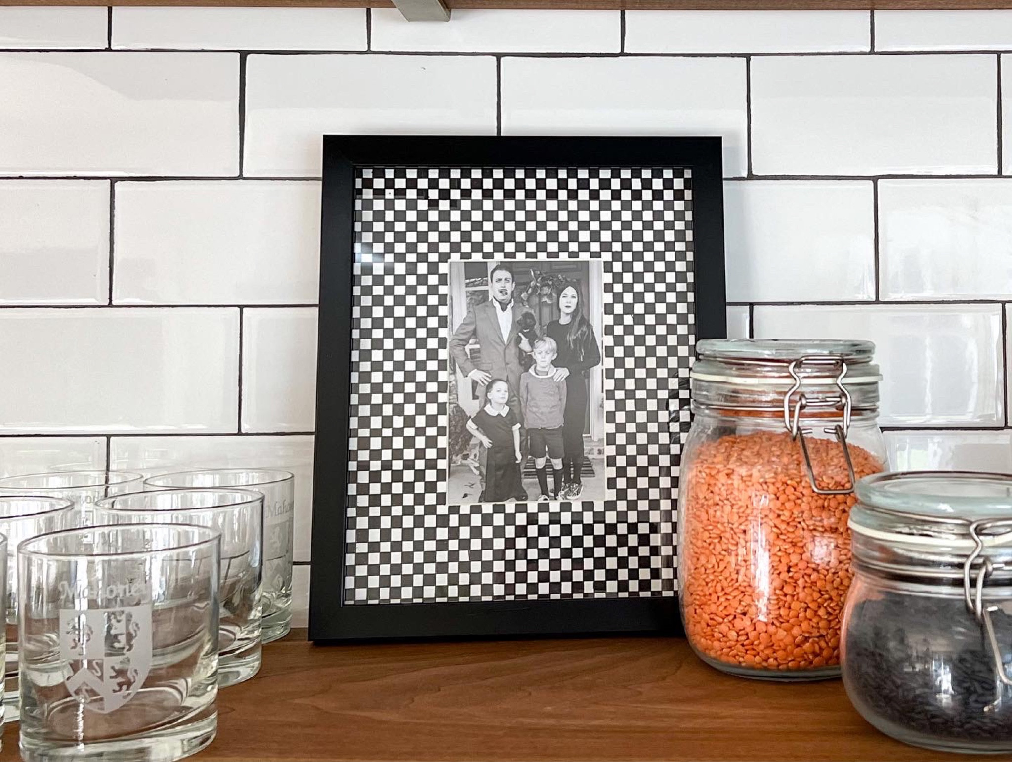 Easy DIY checkered picture frame matting - find step by step instructions at Buildingbluebird.com/diy-checkered-frame

#LTKSeasonal #LTKhome #LTKHalloween