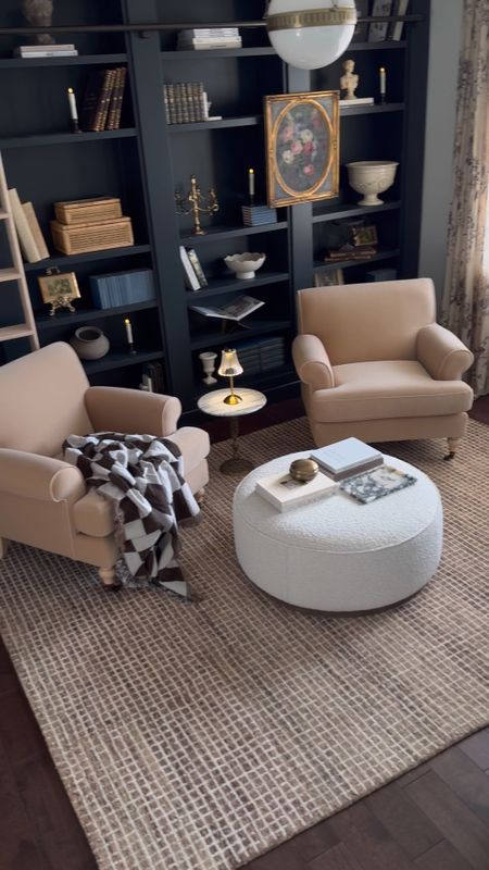 Shop my library living room space - got a new rug and chairs. Use my code PEONY15 To save on the rug! #rugsusa #rug #livingroom #accentchair #ottoman

#LTKhome #LTKsalealert