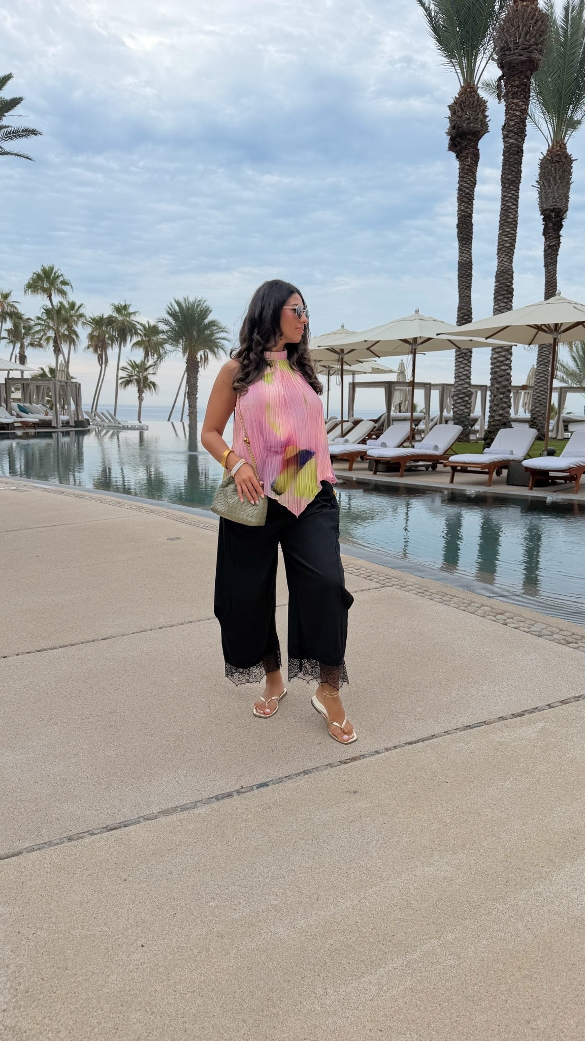 Vacation brunch look. Obsessed with this open back top for vacation. Wearing small in the top and medium in the lace hem pants

#LTKootd #LTKMidsize #LTKSeasonal