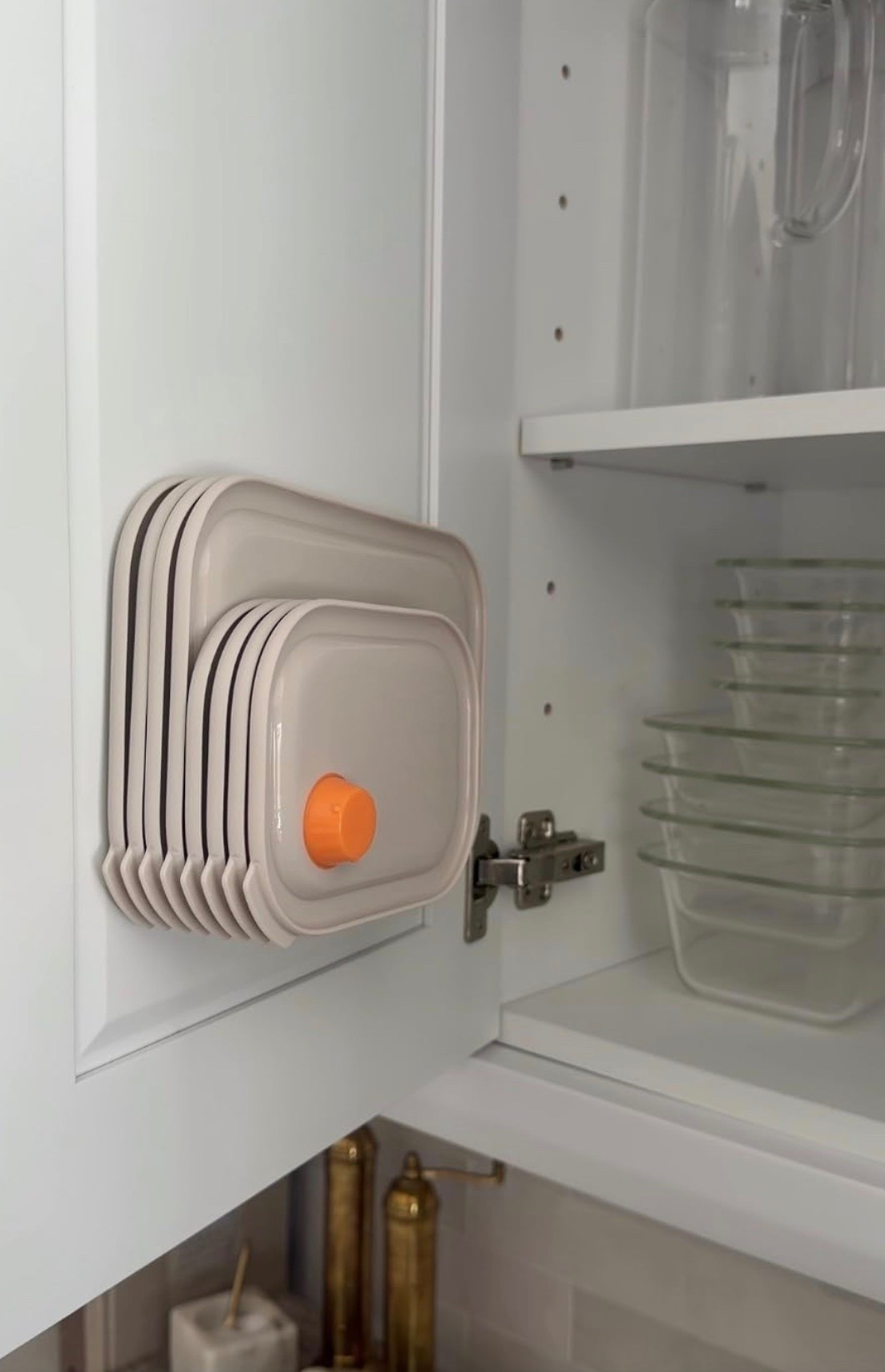 Kitchen organization that is so good. The perfect find to store all the tops to your food storage containers. They will stay neat, organized, and all together…never to be lost again.

#LTKmomlife #LTKHome #LTKfoodie