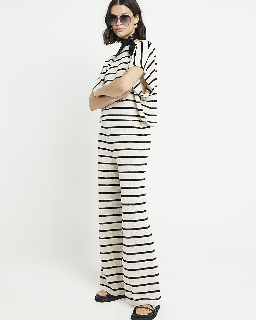 Black stripe knit wide leg trousers | River Island (UK & IE)