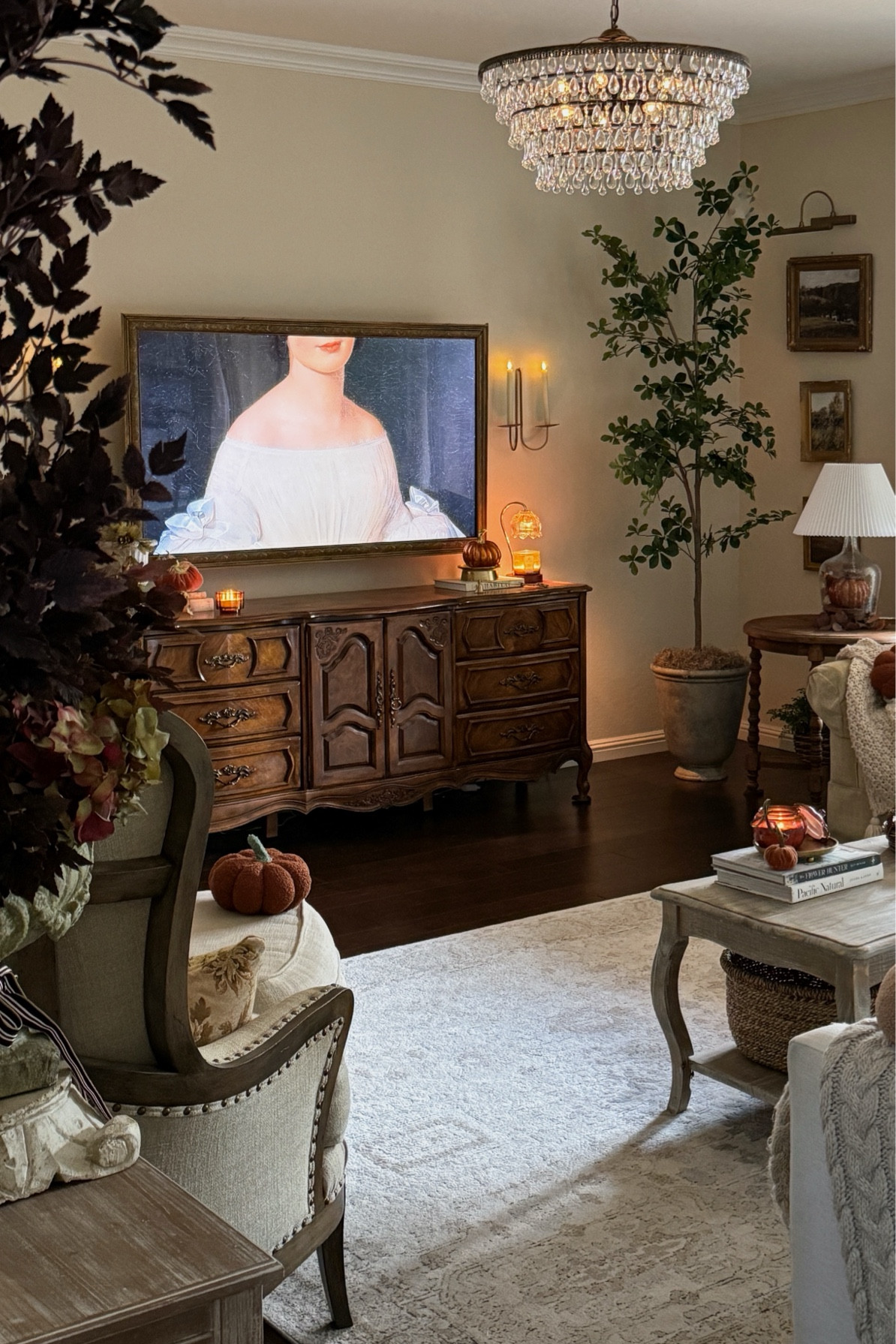 Living room touches.

Neutral rug, candle sconces, tall olive tree, faux cement planter, French country dresser, crystal chandelier, French country coffee table, Flameless candles, French country furniture 

#founditonamazon #falldecor #cozyhome #frenchcountry 

#LTKHome