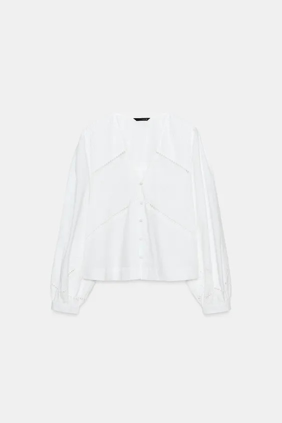 Model height: 183 cmV-neck shirt featuring pintucks and long sleeves with embroidery. Finished wi... | Zara UK