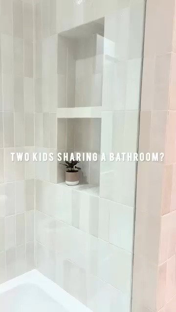 When renovating the kids bathroom I wanted a vertical niche look, but I didn’t want the vertical niche with all the space wasted at the top, for this reason I decided to separate it right in the middle. My kids have an almost six year gap. Just like many siblings they sometimes get on each other’s nerves. My 11 year old preteen uses different products than my 5 year old and I just knew I had to give them their own designated space so one or the other doesn’t complain who is taking the most space in the niche (sibling reasons to fights lol). I know one of my kids will say, “eww your shampoo bottle is touching mine.” Regardless, this is a design idea to consider when sharing a bathroom with someone else. You each have your own designated space.

Comment SHOP for links (must be a follower for link to come through)

#bathroomreno #bathroomsofinstagram #bathroomrenovation #bathroomremodel #bathroomdesignideas #moderntradionalstyle #chloetile #subwaytile