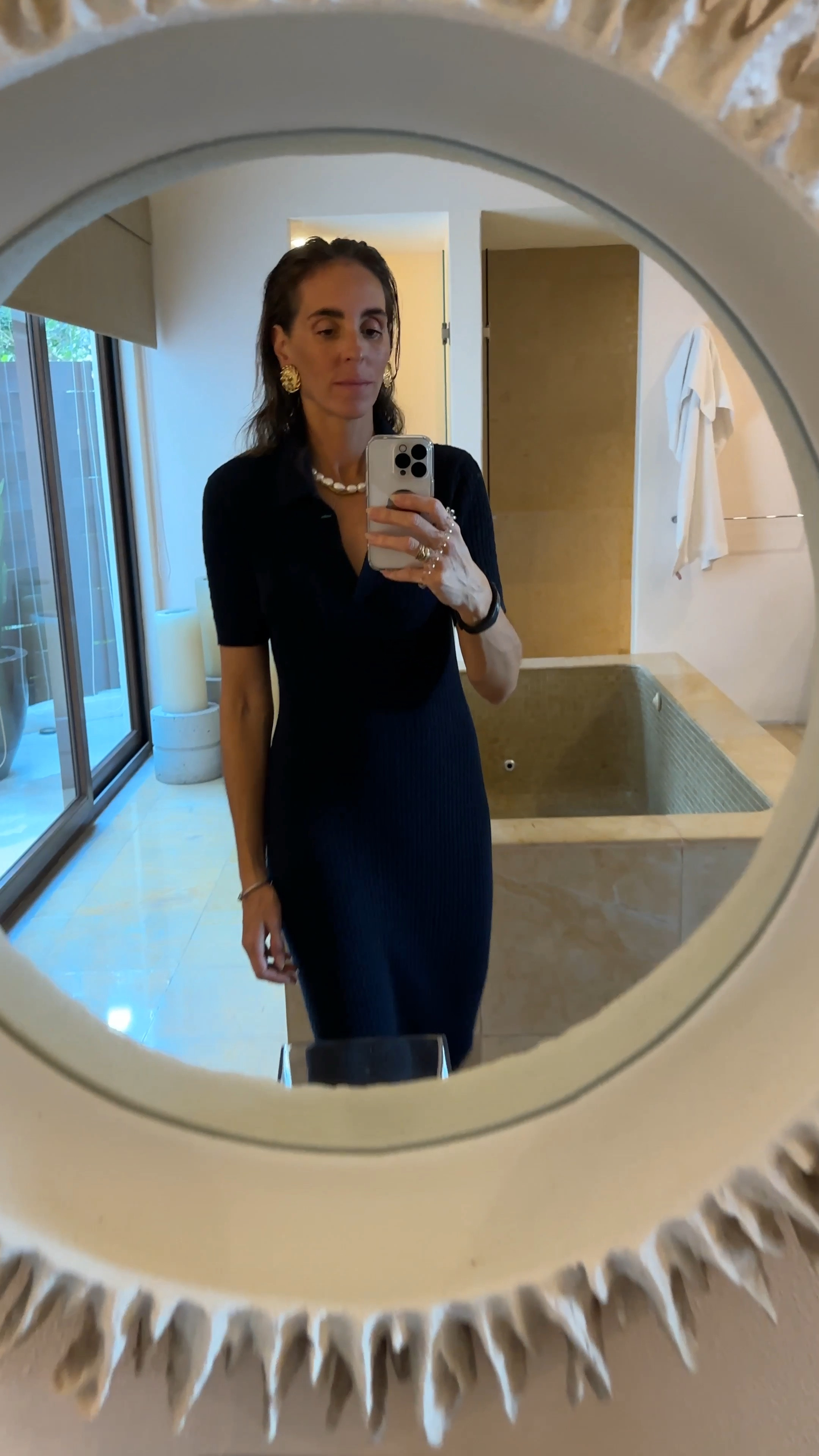 Knit navy polo midi dress with vintage gold Lion clip on statement earrings 


#LTKfit #LTKSeasonal #LTKtravel