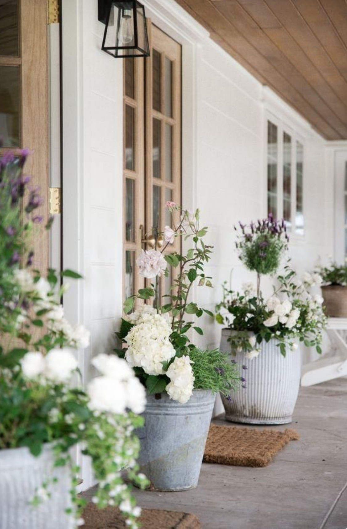 Elevate your outdoor space by adding extra-large planters with stunning blooms. White flowers are classic, but if you need a dose of colour, shades of pink and purple are a lovely option.  

#outdoorliving #patioseason #ltkhome #ltkoutdoors #ltksummer #ltkstyletip #outdoordecor #frontporch #outdoorfurniture #ltkunder100

#LTKcanada #LTKcasa #LTKsale