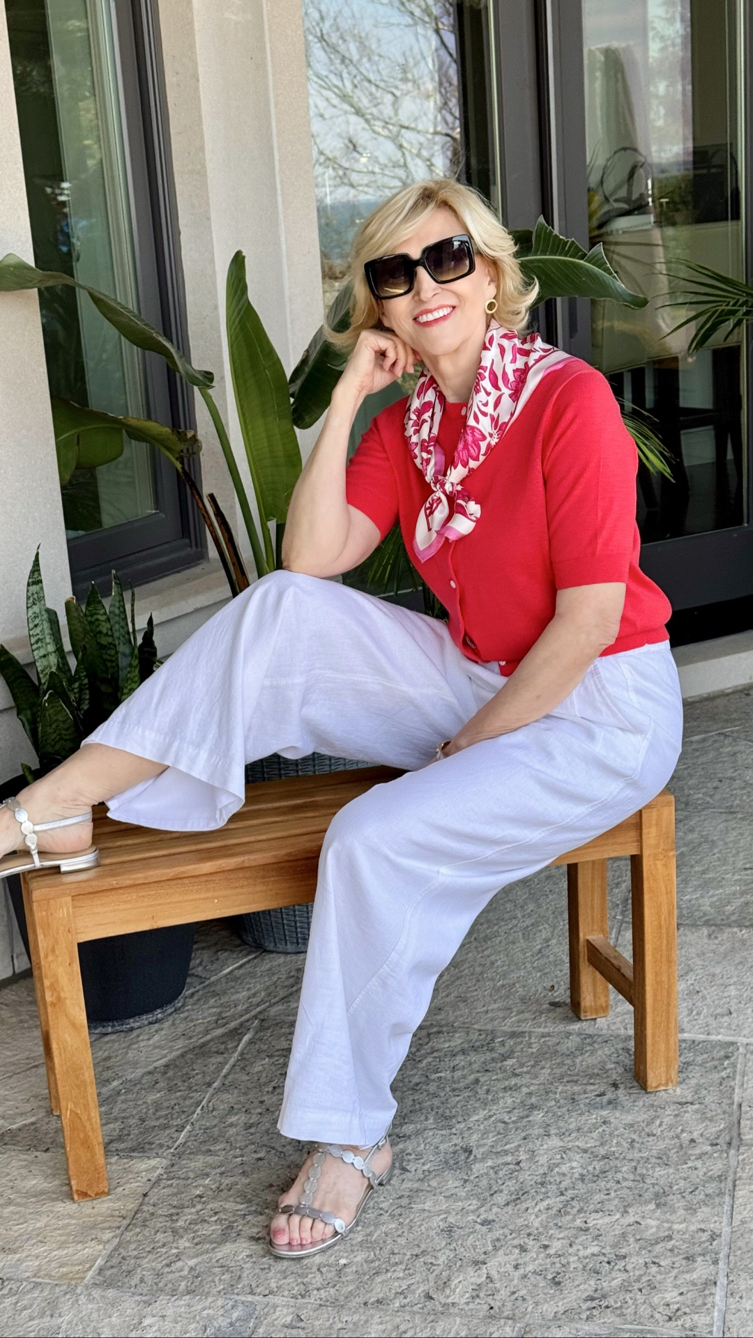 I’ve always believed some of the best outfits are the simple ones with a little personality, and this look feels exactly like that to me. A bright red sweater, crisp white linen pants, and a pretty pink floral scarf somehow feel classic, fresh, and cheerful all at once.

I know many women over 50 worry about wearing bold color because they think it might feel “too much,” but honestly? Color near your face can be one of the most flattering things you wear. It brings warmth, energy, and life to your whole look.

#LTKOver40 #LTKSeasonal #LTKgrwm