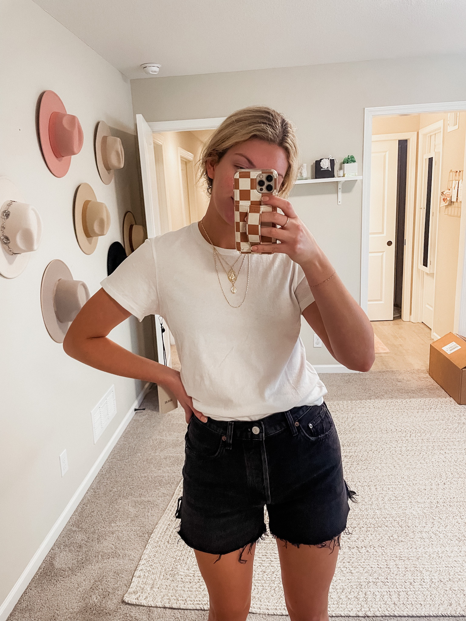 White tshirt. Black denim shorts. TTS 

#LTKFind