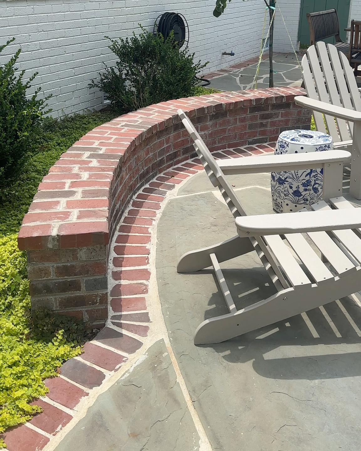 Mixing high low to bring our patio to life was such a fun challenge! A Wal-Mart patio set with custom outdoor pillows, Ballard coffee table, blue and white  stools, and the most durable chairs on the market all came together to make a space we use all the time 💚