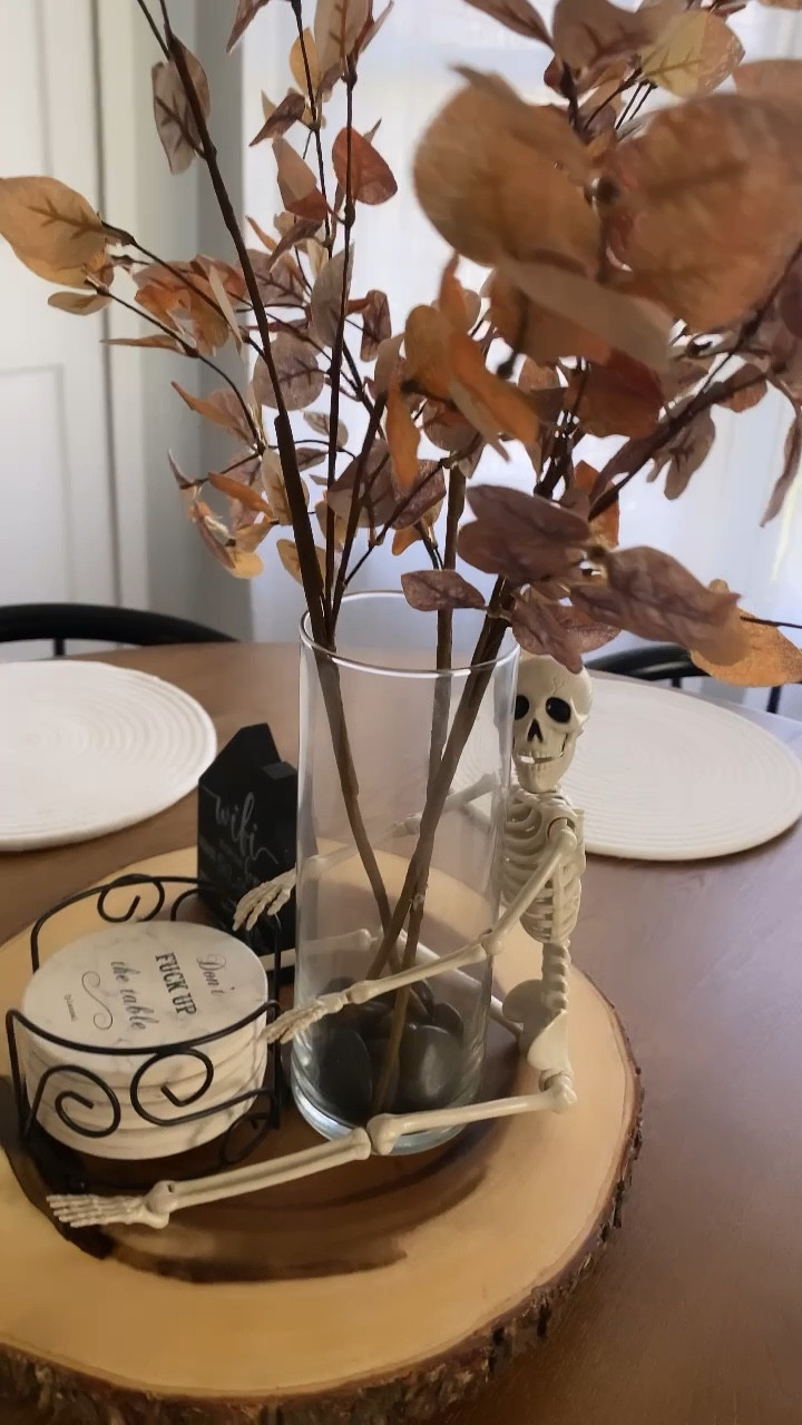 Halloween fall decor for your home. Spooky skeletons, fall color stems and funny table accents for your guests to enjoy. Our rental guests love the seasonal decor!