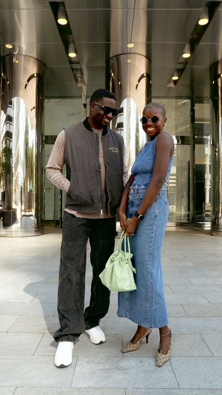 His & Her denim outfits for fall! Denim sleeveless shell, top, denim maxi skirt, Gucci, slingback, heels, round metal frame sunglasses. For him washed black vest with graphics, loose work, wear denim, brown longlong sleeve and new balance 997H sneakers.

#LTKfindsunder100 #LTKmens #LTKSale