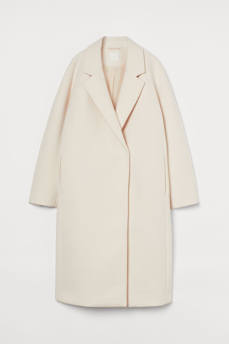 Calf-length coat in woven fabric with notch lapels and a concealed press-stud fastening. Relaxed ... | H&M (UK, MY, IN, SG, PH, TW, HK)