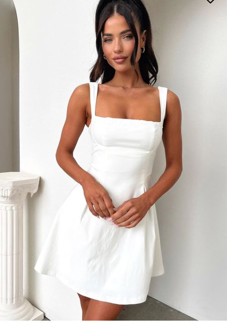 Perfect white mini dress. Really cute details. Perfect for wedding season. Bride to be dress. Affordable white dress.

#LTKSeasonal #LTKwedding #LTKGiftGuide
