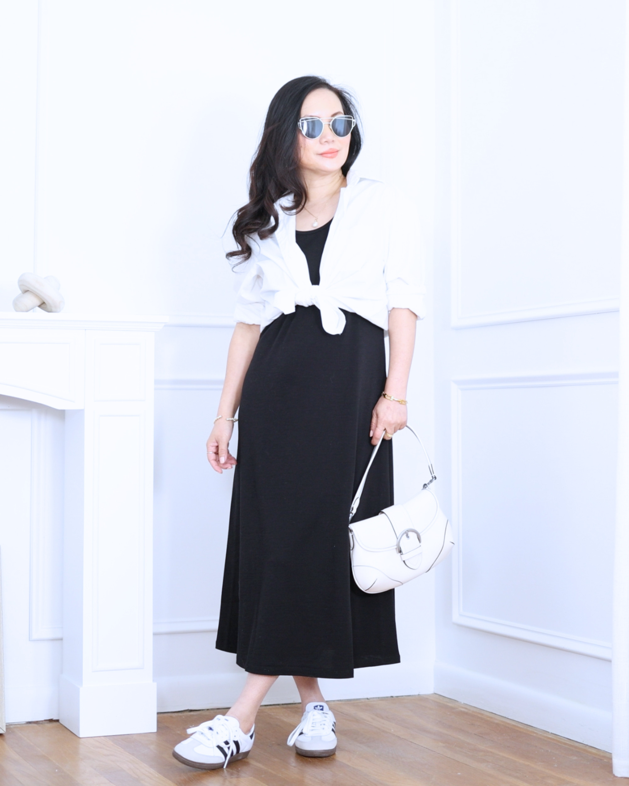 Black long dress from Unbound Merino layered with a white shirt from Uniqlo and finished with Samba sneakers — relaxed, cool, and effortlessly styled for everyday wear. I'm 5'2, wearing size S. 

 #LTKootd #LTKOver40 #LTKPetite