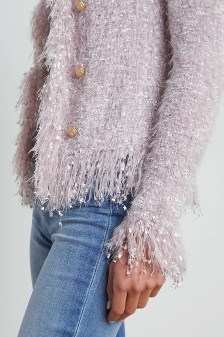 In love with this fringe knit cardigan sweater. The color is so pretty  comes in several different colors too. All of them are so pretty  

#LTKworkwear #LTKstyletip