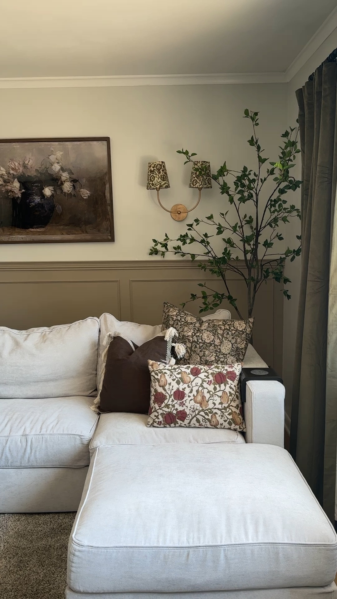 Living Room wall! 

Molding - picture frame molding - trim - large art - cozy - wall sconces - pillows - faux tree - curtains 

#LTKVideo #LTKStyleTip #LTKHome