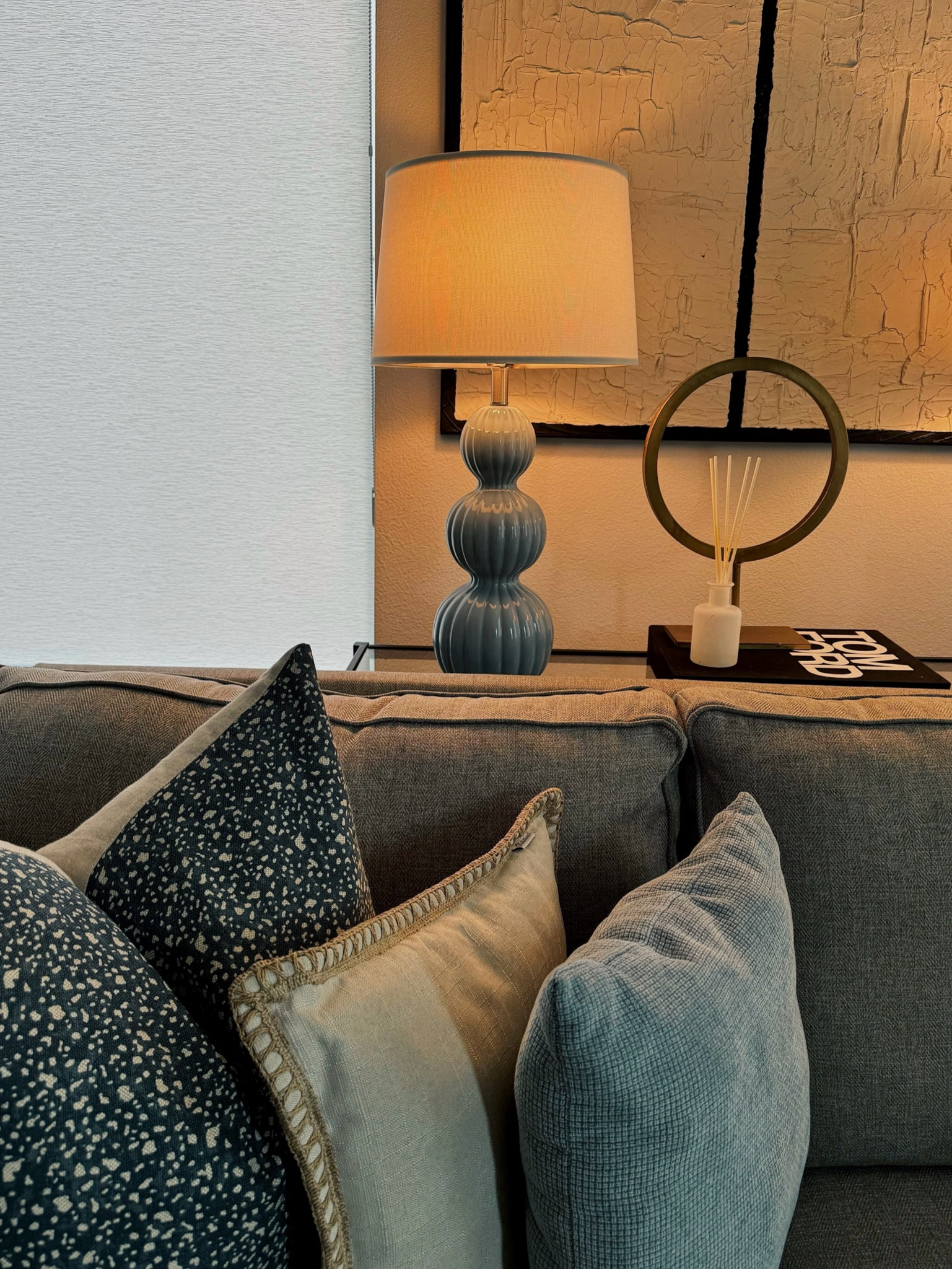 A cozy corner of the living room 🤍 these Amazon lamps come in a set of two and are some of my most favorite details of the house! 

Amazon, Amazon home, throw pillows, blue lamp, textured art, Tom ford book, blue accents

#LTKsalealert #LTKhome #LTKfindsunder100